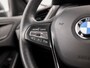 BMW 1-Serie 116i High Executive Automaat (APPLE CARPLAY, NAVIGATIE, CLIMATE, GETINT GLAS, PARKEERSENSOREN, SPORTSTOELEN, CRUISE, NIEUWE APK, NIEUWSTAAT)