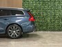 Volvo V60 T6 AWD Recharge Inscription | Trekhaak | Stoelventilatie | Harman Kardon | Stoelmassage | Head-Up Display | Adatpieve Cruise Control | Standkachel met Volvo On Call App | Stoelverwarming voor+achter | Stuurwielverwarming | Full LED Meesturende koplampen | Pilot Assist | BLIS Dode Hoek Detectie | Parkeercamera | Gelamineerde/geluidwerende zijruiten | Elektrische voorstoelen geheugen | Nappa lederen bekleding | Zitting verlenging voorstoelen | Lederen dashboard | 4-Spaaks sportstuurwiel | 18 Inch | Keyless Drive | Parkeersensoren voor+achter | Elektrisch bedienbare achterklep | Climate Control L+R | DAB Radio | Apple Carplay/Android Auto | Volvo On Call met mobiele App functie | Denim Blue Metallic |