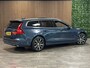 Volvo V60 T6 AWD Recharge Inscription | Trekhaak | Stoelventilatie | Harman Kardon | Stoelmassage | Head-Up Display | Adatpieve Cruise Control | Standkachel met Volvo On Call App | Stoelverwarming voor+achter | Stuurwielverwarming | Full LED Meesturende koplampen | Pilot Assist | BLIS Dode Hoek Detectie | Parkeercamera | Gelamineerde/geluidwerende zijruiten | Elektrische voorstoelen geheugen | Nappa lederen bekleding | Zitting verlenging voorstoelen | Lederen dashboard | 4-Spaaks sportstuurwiel | 18 Inch | Keyless Drive | Parkeersensoren voor+achter | Elektrisch bedienbare achterklep | Climate Control L+R | DAB Radio | Apple Carplay/Android Auto | Volvo On Call met mobiele App functie | Denim Blue Metallic |