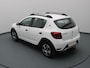 Dacia Sandero TCe Bi-Fuel Stepway Serie Limitee 15th Anniv. 100pk Camera | Cruise | Navi | Parkeersens. achter | Trekhaak afneembaar.
