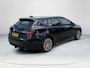 Toyota Corolla Touring Sports 2.0 Hybrid First Edition | Navigatie | Parkeer camera | LM Velgen | Adaptive cruise control | Climate control | Trekhaak