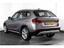 BMW X1 sDrive20i 184 PK - Automaat Orig. NL | Luxery-Line | S/K Panodak | Trekhaak | Cruise | PDC | NAV | Auto.Airco | LM 18" |
