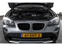 BMW X1 sDrive20i 184 PK - Automaat Orig. NL | Luxery-Line | S/K Panodak | Trekhaak | Cruise | PDC | NAV | Auto.Airco | LM 18" |