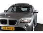 BMW X1 sDrive20i 184 PK - Automaat Orig. NL | Luxery-Line | S/K Panodak | Trekhaak | Cruise | PDC | NAV | Auto.Airco | LM 18" |
