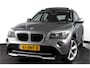 BMW X1 sDrive20i 184 PK - Automaat Orig. NL | Luxery-Line | S/K Panodak | Trekhaak | Cruise | PDC | NAV | Auto.Airco | LM 18" |