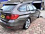 BMW 3-Serie Touring 328i High Executive key-less/head-up display/glazen panorama-dak