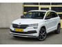 Skoda Karoq 1.5 TSI ACT 150PK! Automaat Sportline Business BJ2020 Lmv 19" | Led V+A | Pdc | Keyless | Panoramadak | Elek. achterklep | Verwarmde voorruit | Achteruitrijcamera | App-Connect | Navi | Virtual cockpit | Dashboard verlichting | Verwarmde voorstoelen