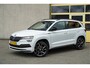Skoda Karoq 1.5 TSI ACT 150PK! Automaat Sportline Business BJ2020 Lmv 19" | Led V+A | Pdc | Keyless | Panoramadak | Elek. achterklep | Verwarmde voorruit | Achteruitrijcamera | App-Connect | Navi | Virtual cockpit | Dashboard verlichting | Verwarmde voorstoelen