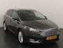 Ford Focus Wagon EcoBoost 125 pk Titanium | Trekhaak | Voorruitverw. | Navi | Clima | Cruise | 17" | Keyless entry