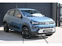 Dacia Spring Extreme 65 26.8 kWh | DC-LADER | CAMERA | NAVI | AIRCO | APPLECARPLAY/ANDROIDAUTO | CRUISE CONTROL | PDC