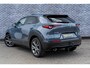 Mazda CX-30 2.0 e-SkyActiv-X M Hybrid Luxury | Trekhaak | Schuifdak | Lederen Bekleding | Bose Audio | Head-up Display | Lichtmetalen Velgen | Elektrische Achterklep | Keyless Entry | Navigatie | Apple Carplay Android Auto | Achteruitrijcamera | Parkeersensoren