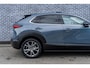 Mazda CX-30 2.0 e-SkyActiv-X M Hybrid Luxury | Trekhaak | Schuifdak | Lederen Bekleding | Bose Audio | Head-up Display | Lichtmetalen Velgen | Elektrische Achterklep | Keyless Entry | Navigatie | Apple Carplay Android Auto | Achteruitrijcamera | Parkeersensoren