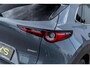 Mazda CX-30 2.0 e-SkyActiv-X M Hybrid Luxury | Trekhaak | Schuifdak | Lederen Bekleding | Bose Audio | Head-up Display | Lichtmetalen Velgen | Elektrische Achterklep | Keyless Entry | Navigatie | Apple Carplay Android Auto | Achteruitrijcamera | Parkeersensoren