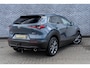 Mazda CX-30 2.0 e-SkyActiv-X M Hybrid Luxury | Trekhaak | Schuifdak | Lederen Bekleding | Bose Audio | Head-up Display | Lichtmetalen Velgen | Elektrische Achterklep | Keyless Entry | Navigatie | Apple Carplay Android Auto | Achteruitrijcamera | Parkeersensoren