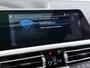 BMW 3-Serie Touring 330e High Executive M Sport interieur | Panoramadak | Trekhaak | HUD | Leder |