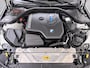 BMW 3-Serie Touring 330e High Executive M Sport interieur | Panoramadak | Trekhaak | HUD | Leder |