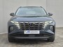 Hyundai Tucson 1.6 T-GDI PHEV Comfort 4WD / Fabrieksgarantie tot 02-2027 / Dealer onderhouden / Stuur- & Stoelverwarming / Trekgewicht 1350 kg / Achteruitrijcamera / Adaptief cruise control / Apple Carplay Android Auto / Draadloze telefoon lader / Keyless Entry/Start /