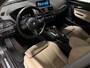 BMW 1-Serie 118i Centennial High Executive (M-SPORT, LED, LEDER, NAVI, STOELVERWARMING)