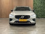 Volvo V60 T8 AWD Recharge Ultra Dark | Trekhaak | Schuifdak | 455pk | Head-Up Display | Harman Kardon | Adaptieve Cruise Control | Stoelverwarming voor+achter | Stuurwielverwarming | Full LED Meesturende koplampen | Parkeercamera | Pilot Assist | BLIS Dode Hoek Detectie | Parkeercamera | Elektrische voorstoelen geheugen | Lederen bekleding | Zitting verlenging voorstoelen | Lederen dashboard | 19 Inch | Google Infotainment | Keyless Drive | Parkeersensoren voor+achter | Privacy Glass | Elektrisch bedienbare achterklep | DAB Radio | Apple Carplay/Android Auto | Volvo On Call met mobiele App functie | Silver Dawn Metallic |