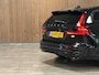 Volvo V60 T6 AWD Recharge Plus Dark | Schuifdak | Trekhaak | Adaptieve Cruise Control | Stoelverwarming voor+achter | Stuurwielverwarming | Full LED Meesturende koplampen | Pilot Assist | BLIS Dode Hoek Detectie | Parkeercamera Elektrische voorstoelen geheugen | Lederen bekleding | Zitting verlenging voorstoelen | 18 Inch | Google Infotainment | Keyless Drive | Privacy Glass | Parkeersensoren voor+achter | Elektrisch bedienbare achterklep | DAB Radio | Apple Carplay/Android Auto | Volvo On Call met mobiele App functie | Onyx Black Metallic |
