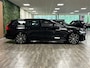 Volvo V60 T6 AWD Recharge Plus Dark | Trekhaak | 360° Camera | All Season banden | Harman Kardon | Adaptieve Cruise Control | Stoelverwarming voor+achter | Stuurwielverwarming | Pilot Assist | BLIS Dode Hoek Detectie | Elektrische voorstoelen geheugen | R-Design Contour stoelen met wit stiksel en bies | Zitting verlenging voorstoelen | 18 Inch | Google Infotainment | Keyless Drive | Parkeersensoren voor+achter | Elektrisch bedienbare achterklep | DAB Radio | Apple Carplay/Android Auto | Volvo On Call met mobiele App functie | Onyx Black Metallic |