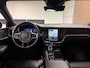 Volvo V60 T6 AWD Recharge Plus Dark | Trekhaak | 360° Camera | All Season banden | Harman Kardon | Adaptieve Cruise Control | Stoelverwarming voor+achter | Stuurwielverwarming | Pilot Assist | BLIS Dode Hoek Detectie | Elektrische voorstoelen geheugen | R-Design Contour stoelen met wit stiksel en bies | Zitting verlenging voorstoelen | 18 Inch | Google Infotainment | Keyless Drive | Parkeersensoren voor+achter | Elektrisch bedienbare achterklep | DAB Radio | Apple Carplay/Android Auto | Volvo On Call met mobiele App functie | Onyx Black Metallic |