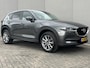 Mazda CX-5 2.0 SkyActiv-G 165 Comfort / Trekhaak (2.000KG) / Cruise Control / Lane Assist / Dode Hoek Detectie / Stuur-, Stoel Verwarming / Airco / Bluetooth / Full-Map Navigatie / Elektr-Bestuurderstoel Met Geheugen /