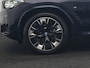 BMW X3 M iX3 Sport 80 kWh 286pk Dealer O.H. | Trekhaak Af Fabriek | Panodak | Head Up | Adaptive Cruise | 360 Camera | Adaptief Onderstel | Harman / Kardon | Lederen Sportstoelen Memory & Verwarmd | Keyless | Blis | Apple Carplay | Sfeerverlichting | Navigatie | DAB | 20"L.M |