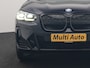 BMW X3 M iX3 Sport 80 kWh 286pk Dealer O.H. | Trekhaak Af Fabriek | Panodak | Head Up | Adaptive Cruise | 360 Camera | Adaptief Onderstel | Harman / Kardon | Lederen Sportstoelen Memory & Verwarmd | Keyless | Blis | Apple Carplay | Sfeerverlichting | Navigatie | DAB | 20"L.M |