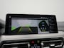 BMW X3 M iX3 Sport 80 kWh 286pk Dealer O.H. | Trekhaak Af Fabriek | Panodak | Head Up | Adaptive Cruise | 360 Camera | Adaptief Onderstel | Harman / Kardon | Lederen Sportstoelen Memory & Verwarmd | Keyless | Blis | Apple Carplay | Sfeerverlichting | Navigatie | DAB | 20"L.M |