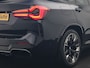 BMW X3 M iX3 Sport 80 kWh 286pk Dealer O.H. | Trekhaak Af Fabriek | Panodak | Head Up | Adaptive Cruise | 360 Camera | Adaptief Onderstel | Harman / Kardon | Lederen Sportstoelen Memory & Verwarmd | Keyless | Blis | Apple Carplay | Sfeerverlichting | Navigatie | DAB | 20"L.M |