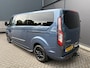 Ford Transit Custom 320 2.0 TDCI L2H1 Platinum Edition DC Automaat Achteruitrijcamera - Parkeersensoren - Navigatie - Airco - Dodehoek detector - Cruise control - Licht metalen velgen 16 inch - Lederen bekleding - Radio - Bluetooth - Dubbele cabine - Tussens - Mistlampen voor - Sidebars - Trekhaak - Voorstoelen verwarmd - Led verlichting - Extra getint glas achter - Start/stop systeem - Stuur multifunctioneel - Stuur leder - Regensensor
