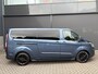 Ford Transit Custom 320 2.0 TDCI L2H1 Platinum Edition DC Automaat Achteruitrijcamera - Parkeersensoren - Navigatie - Airco - Dodehoek detector - Cruise control - Licht metalen velgen 16 inch - Lederen bekleding - Radio - Bluetooth - Dubbele cabine - Tussens - Mistlampen voor - Sidebars - Trekhaak - Voorstoelen verwarmd - Led verlichting - Extra getint glas achter - Start/stop systeem - Stuur multifunctioneel - Stuur leder - Regensensor