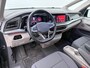 Volkswagen Multivan 1.4 eHybrid L2H1 Style | Pano Dak | Trekhaak | Camera | Elek. Achterklep | Parkeerhulp | Matrix LED | Spiegelpakket | Getint Glas | 18'' |
