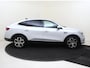 Renault Arkana 1.6 E-Tech Hybrid 145 Intens | Apple Carplay/Android Auto | Autonomous Emergency Braking | cruise control adaptief | dodehoek detectie | electronic climate control | lederen/stof bekleding | LED koplampen | lichtmetalen velgen 18" | navigatiesysteem |