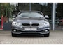 BMW 4-Serie Cabrio 428i Sport | 19 Inch | Stoelverwarming | Mineral Grau | Cruise | Lage KM | Hardtop | Trekhaak | Recent onderhoud | Nieuwe velgen en banden | Rijklaar