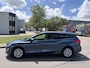 Ford Focus Wagon 1.0i EcoBoost Hybrid Titanium X Business 6-Bak 125 PK. Nieuwe auto en zeer zuinig !!! Open panoramadak !! Zeker een kansje deze auto !