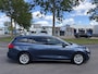 Ford Focus Wagon 1.0i EcoBoost Hybrid Titanium X Business 6-Bak 125 PK. Nieuwe auto en zeer zuinig !!! Open panoramadak !! Zeker een kansje deze auto !