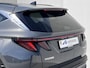 Hyundai Tucson 1.6 T-GDI HEV 215pk Premium / Nieuw model / Fabrieksgarantie tot 7-2029 / Dealer onderhouden / Navigatie / Stuur- en stoelverwarming / Elektrische klep / Adaptieve CC / 19"LM wielen /
