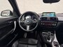 BMW 1-Serie M140i xDrive High Executive HK Pano Memory Camera