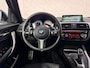 BMW 1-Serie M140i xDrive High Executive HK Pano Memory Camera