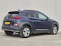 Hyundai Kona Electric EV Fashion 64 kWh / Head Up Display / CCS snelladen / Warmtepomp / Achteruitrijcamera / Apple Carplay Android Auto / Draadloze telefoon lader / Keyless Entry/Start / Navigatie / Krell Audio Systeem / Parkeersensoren achter /