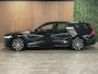 Volvo V60 T6 AWD Recharge Plus Dark | Trekhaak | 360° Camera | All Season banden | Harman Kardon | Adaptieve Cruise Control | Stoelverwarming voor+achter | Stuurwielverwarming | Pilot Assist | BLIS Dode Hoek Detectie | Elektrische voorstoelen geheugen | R-Design Contour stoelen met wit stiksel en bies | Zitting verlenging voorstoelen | 18 Inch | Google Infotainment | Keyless Drive | Parkeersensoren voor+achter | Elektrisch bedienbare achterklep | DAB Radio | Apple Carplay/Android Auto | Volvo On Call met mobiele App functie | Onyx Black Metallic |