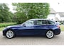 BMW 3-Serie Touring 330i Centennial Executive | Trekhaak | LED | Navi | PDC |