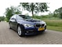 BMW 3-Serie Touring 330i Centennial Executive | Trekhaak | LED | Navi | PDC |