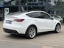 Tesla Model Y Long Range AWD 75 kWh SOH 92% | AFNEEMBARE TREKHAAK| ENHANCED AUTOPILOT| RESTERENDE ALGEMENE FABRIEKSGARANTIE TESLA T/M 03-2028 OF 80.000KM| ACCU + AANDRIJFLIJN T/M 03-2032/ 192.000KM| RIJKLAAR GELEVERD