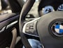BMW X1 xDrive25e High Executive Sportline | Bruin leder | Camera | HUD | Trekhaak | 4x4