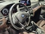 BMW X1 xDrive25e High Executive Sportline | Bruin leder | Camera | HUD | Trekhaak | 4x4