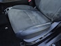 Nissan Ariya Evolve 66 kWh / 99% SOH / Glazen schuif- en kanteldak / CCS snelladen / warmtepomp / Stuur- Stoel & Achterbank verwarming / Head Up Display / Adaptief cruise control / Stoelventilatie / Bose Audio Systeem / Elektrische achterklep / Draadloze telefoon lader /