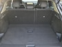 Nissan Ariya Evolve 66 kWh / 99% SOH / Glazen schuif- en kanteldak / CCS snelladen / warmtepomp / Stuur- Stoel & Achterbank verwarming / Head Up Display / Adaptief cruise control / Stoelventilatie / Bose Audio Systeem / Elektrische achterklep / Draadloze telefoon lader /